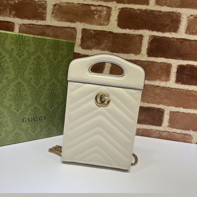 G*u*i top handle bags